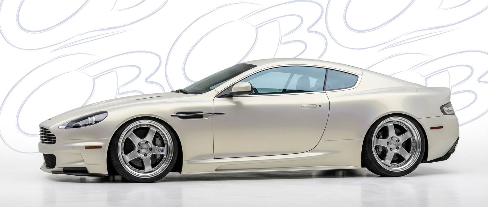 Top-tier 2007 Aston Martin DB9 2007 featuring a high-gloss finish and carbon fiber weave.