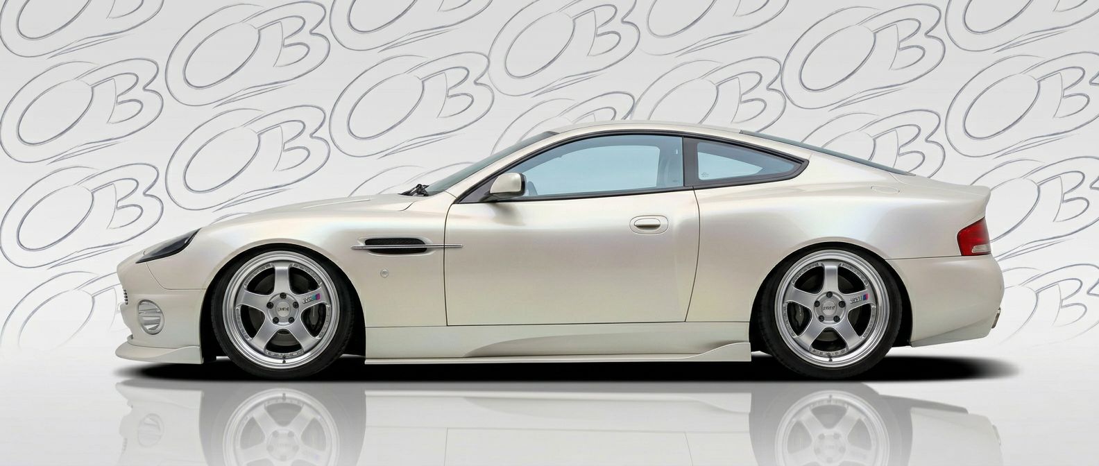 Professional automotive photography of a 2002 Aston Martin Vanquish with high-fidelity 2002.