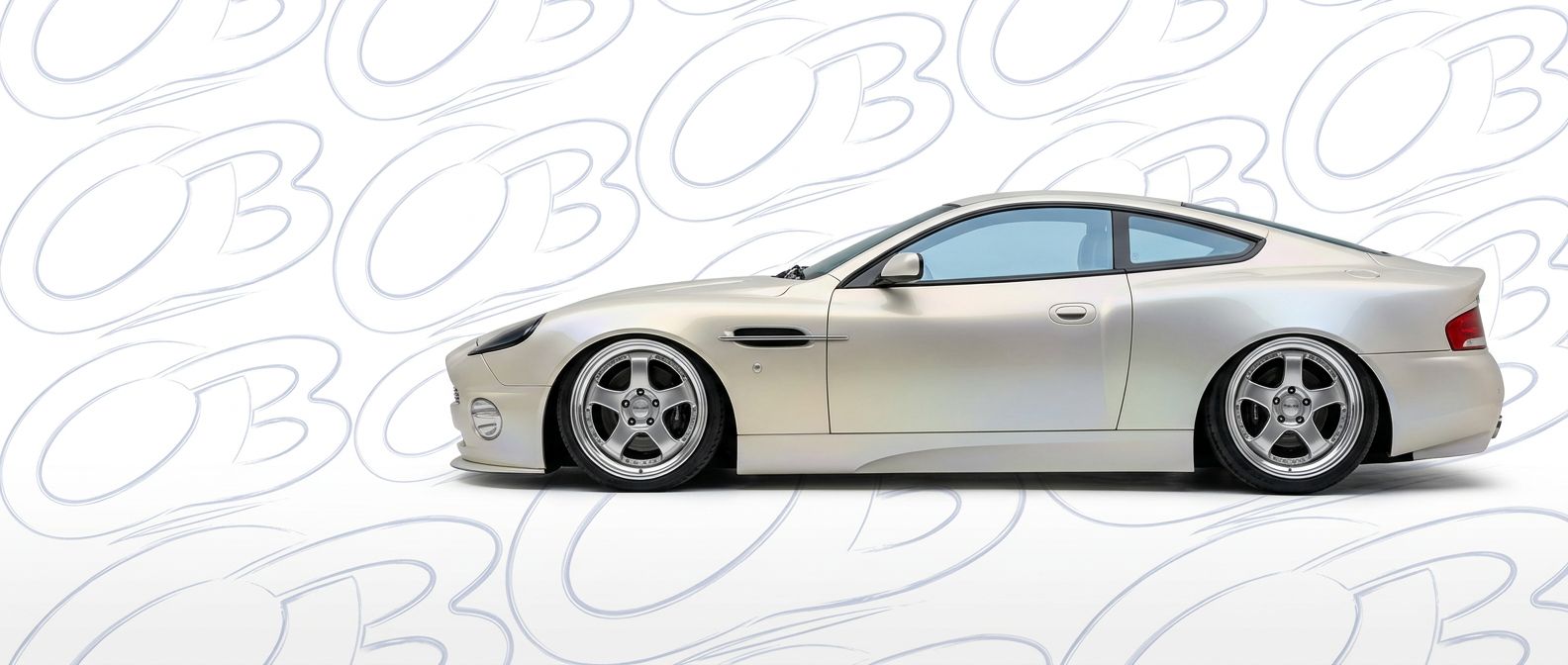 Top-tier  Aston Martin Vanquish Vanquish featuring a high-gloss finish and carbon fiber weave.