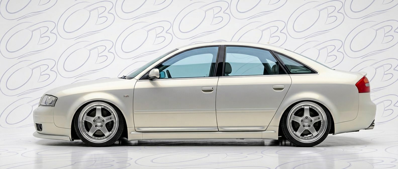 Top-tier 2003 Audi A6 2003 featuring a high-gloss finish and carbon fiber weave.