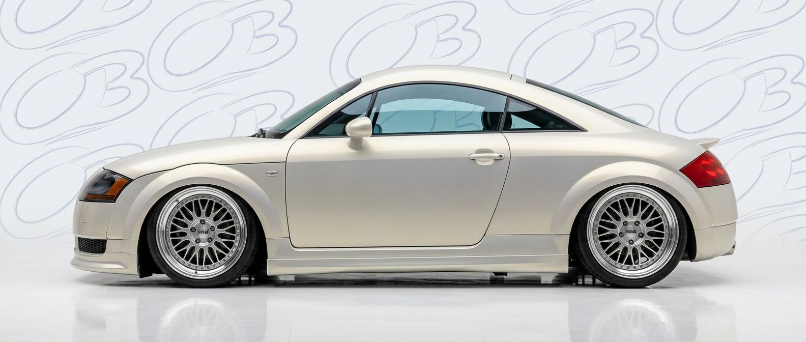 Top-tier 2004 Audi TT 2004 featuring a high-gloss finish and carbon fiber weave.