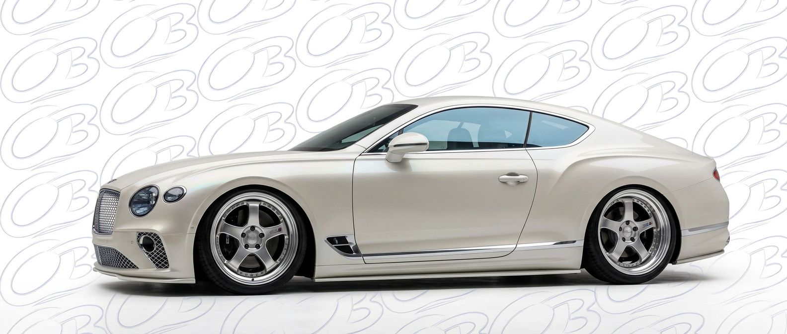 Top-tier  Bentley Continental Continental featuring a high-gloss finish and carbon fiber weave.