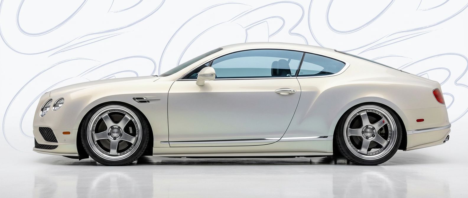 Professional automotive photography of a 2015 Bentley GT with high-fidelity 2015.