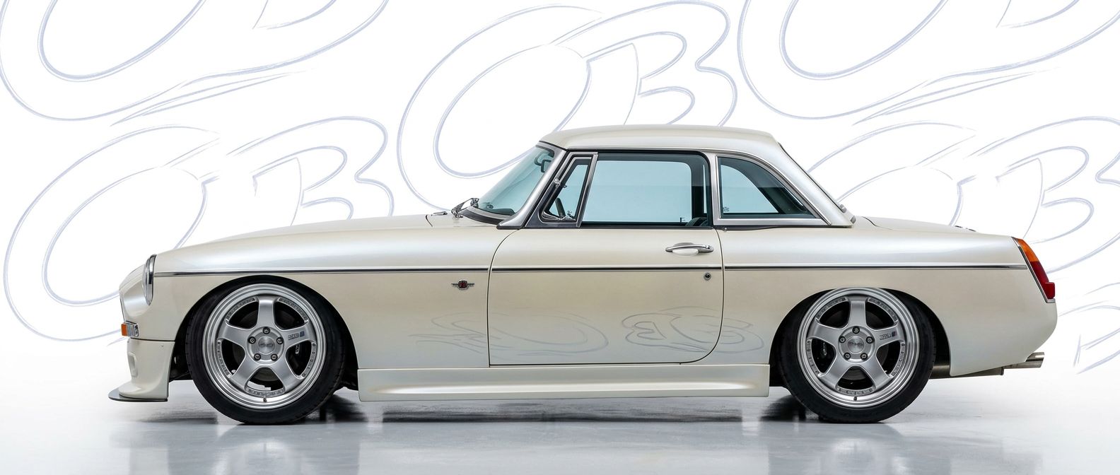 Top-tier 1963 BMC MGB 1963 featuring a high-gloss finish and carbon fiber weave.