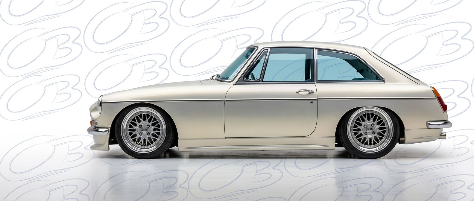 Professional automotive photography of a 1972 BMC MGB with high-fidelity 1972.