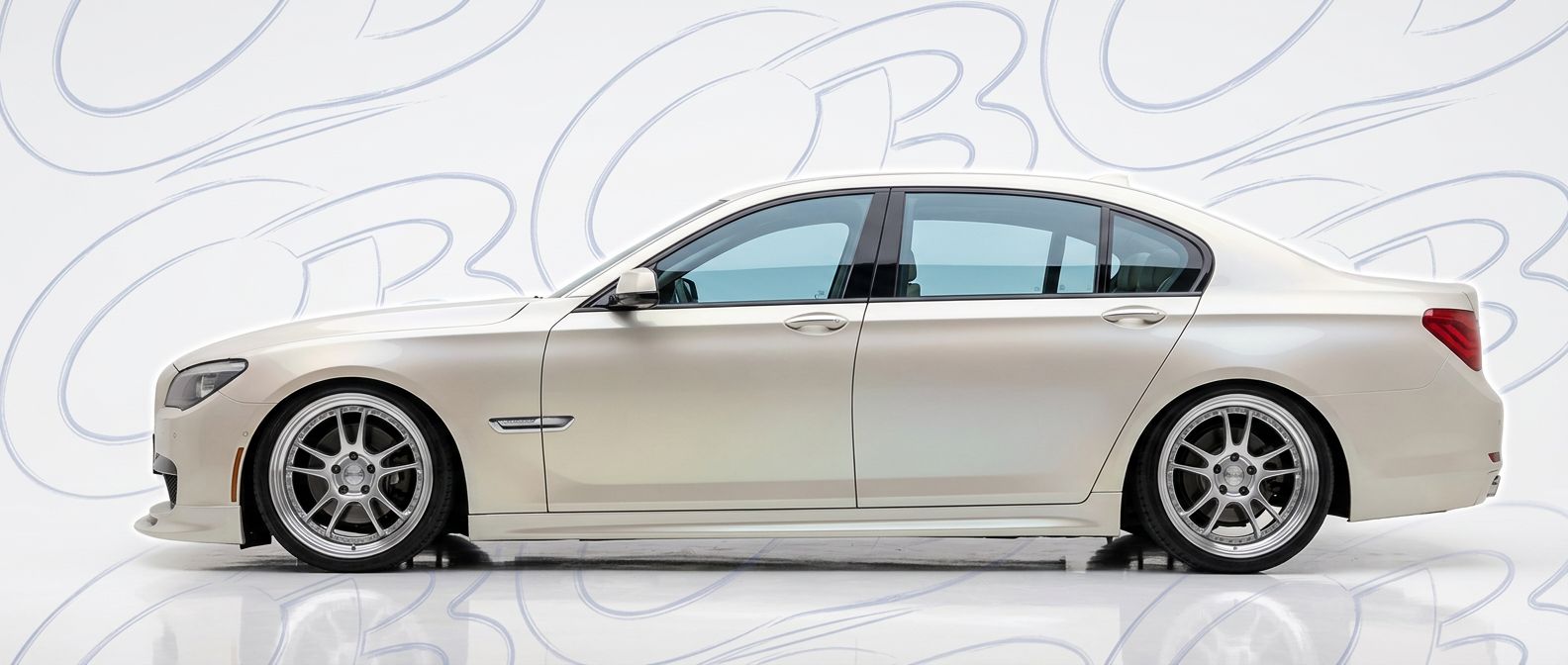 Top-tier 2012 BMW 7-Series 2012 featuring a high-gloss finish and carbon fiber weave.