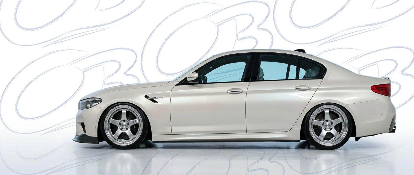 Top-tier 2018 BMW M5 2018 featuring a high-gloss finish and carbon fiber weave.