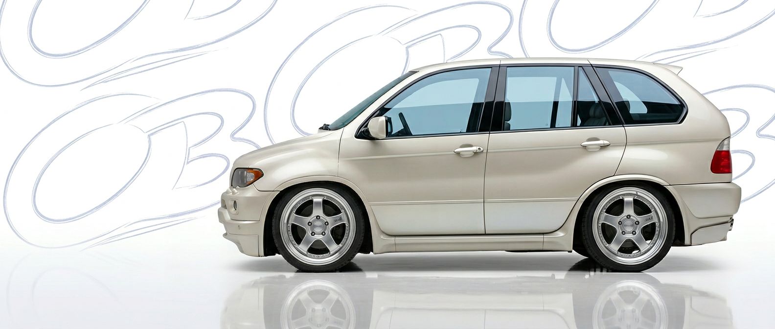 Top-tier 2005 BMW X5 2005 featuring a high-gloss finish and carbon fiber weave.