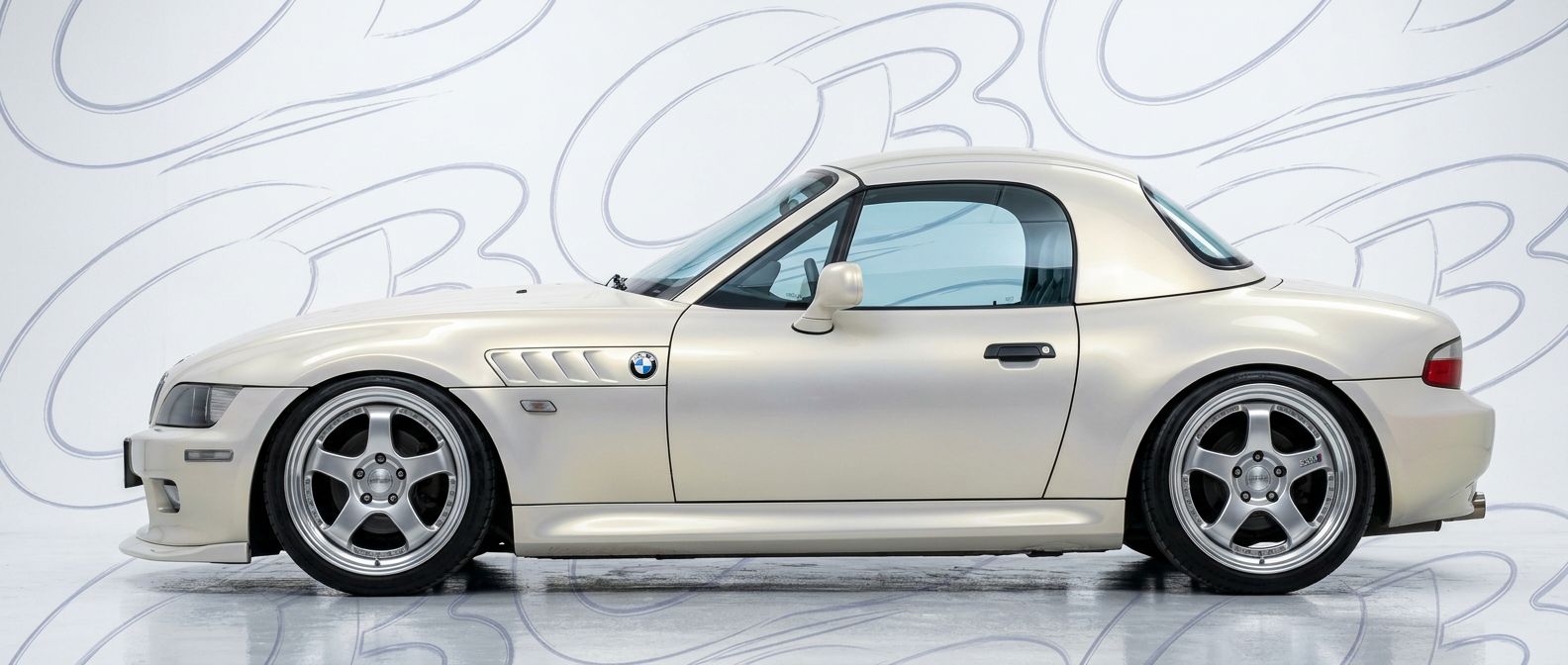Top-tier 1998 BMW Z3 1998 featuring a high-gloss finish and carbon fiber weave.