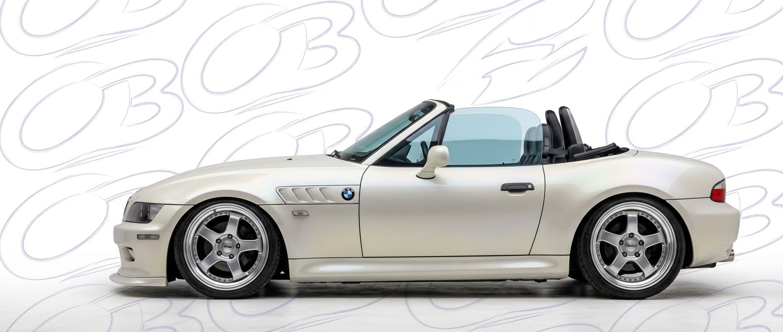 Professional automotive photography of a 2002 BMW Z3 with high-fidelity 2002.