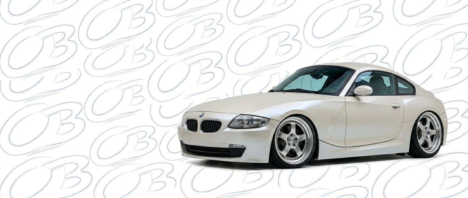 Professional automotive photography of a 2003 BMW Z4 with high-fidelity 2003.