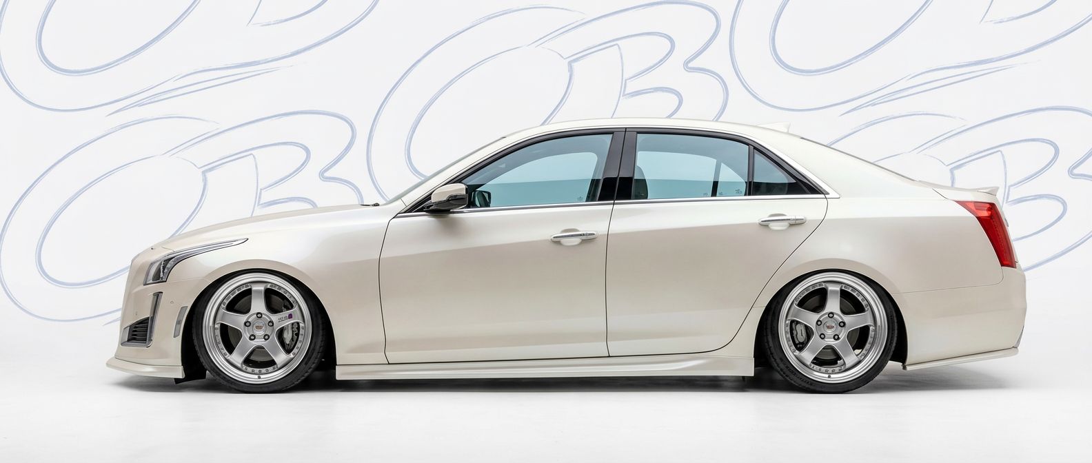 Top-tier 2013 Cadillac CTS 2013 featuring a high-gloss finish and carbon fiber weave.