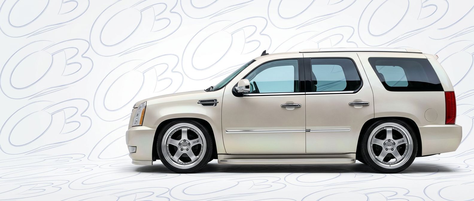 Top-tier 2014 Cadillac Escalade 2014 featuring a high-gloss finish and carbon fiber weave.