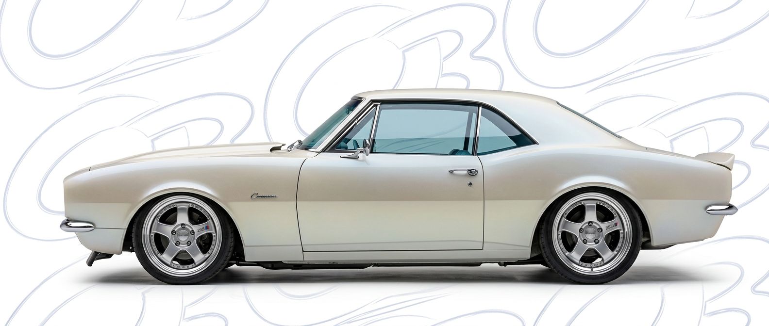 Professional automotive photography of a 1967 Chevrolet Camaro with high-fidelity 1967.