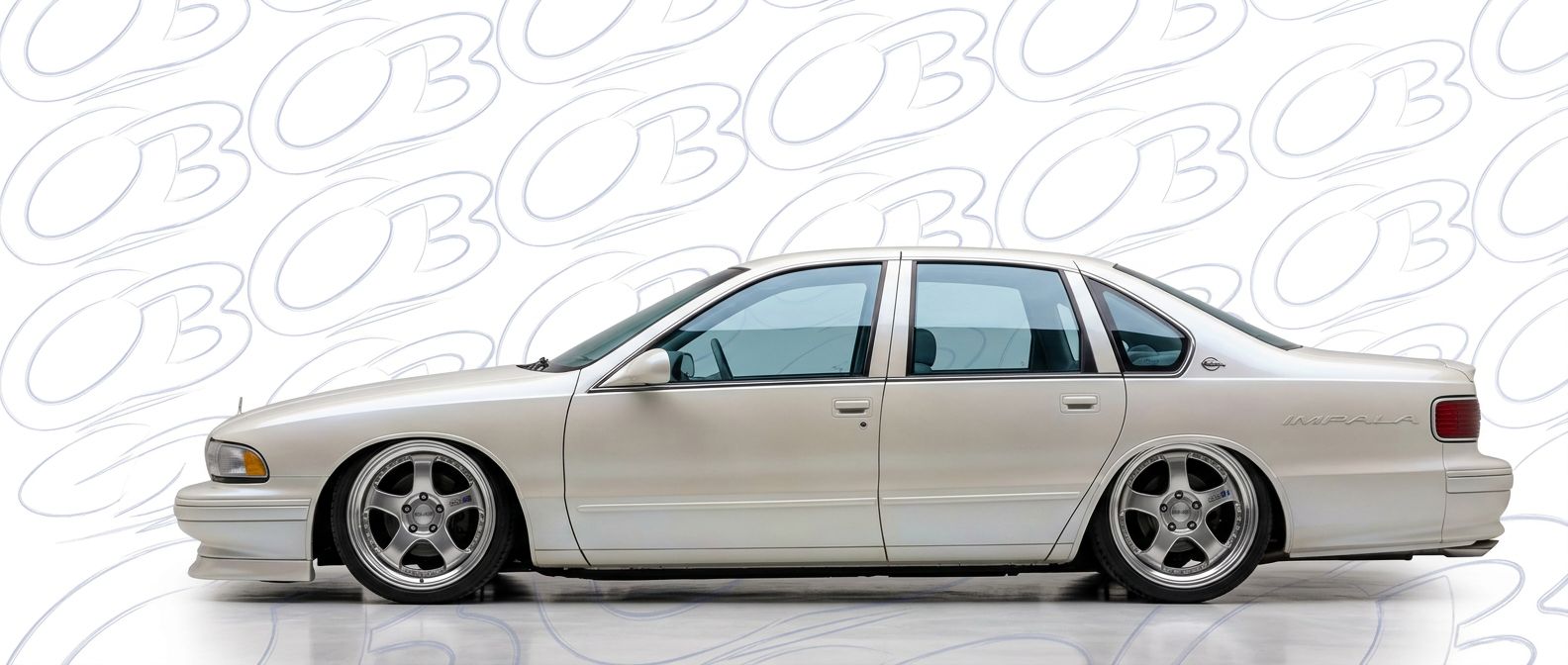 Professional automotive photography of a 1991 Chevrolet Impala with high-fidelity 1991.