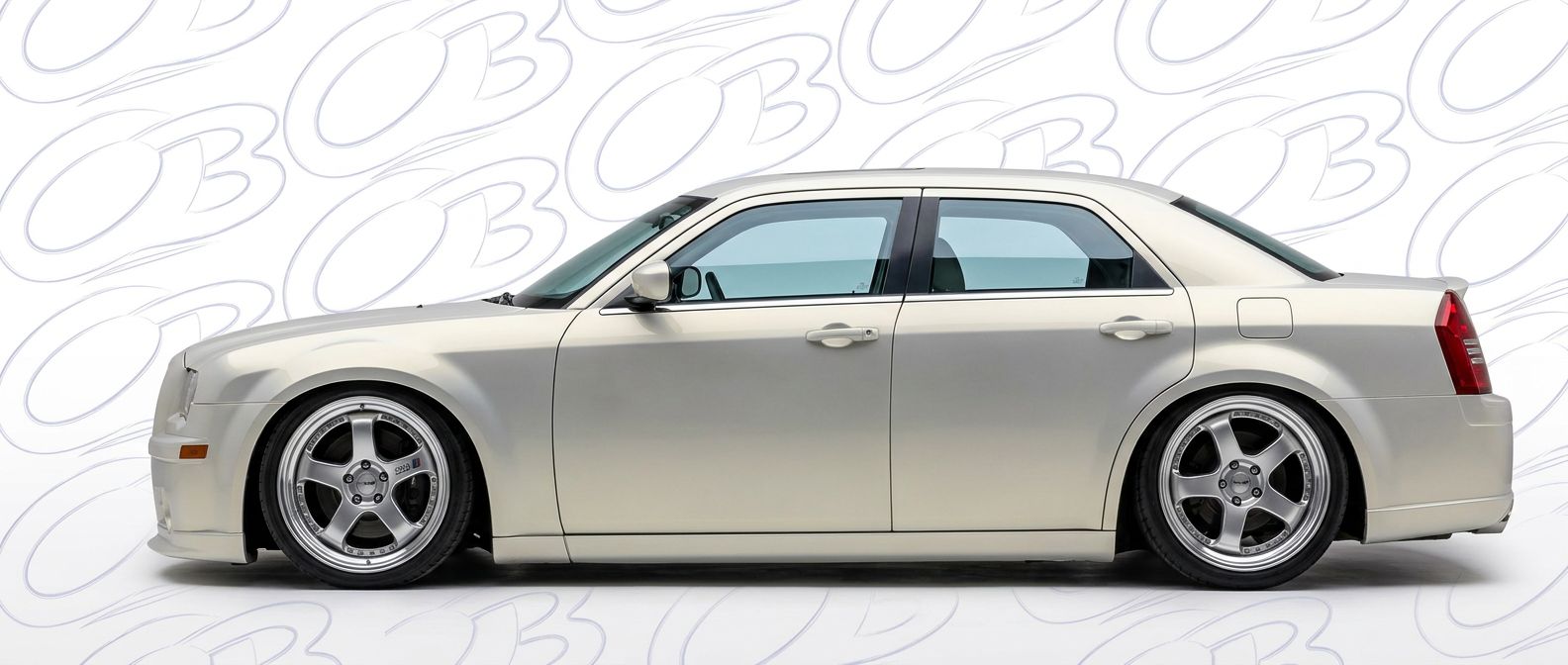 Top-tier 2006 Chrysler 300 2006 featuring a high-gloss finish and carbon fiber weave.