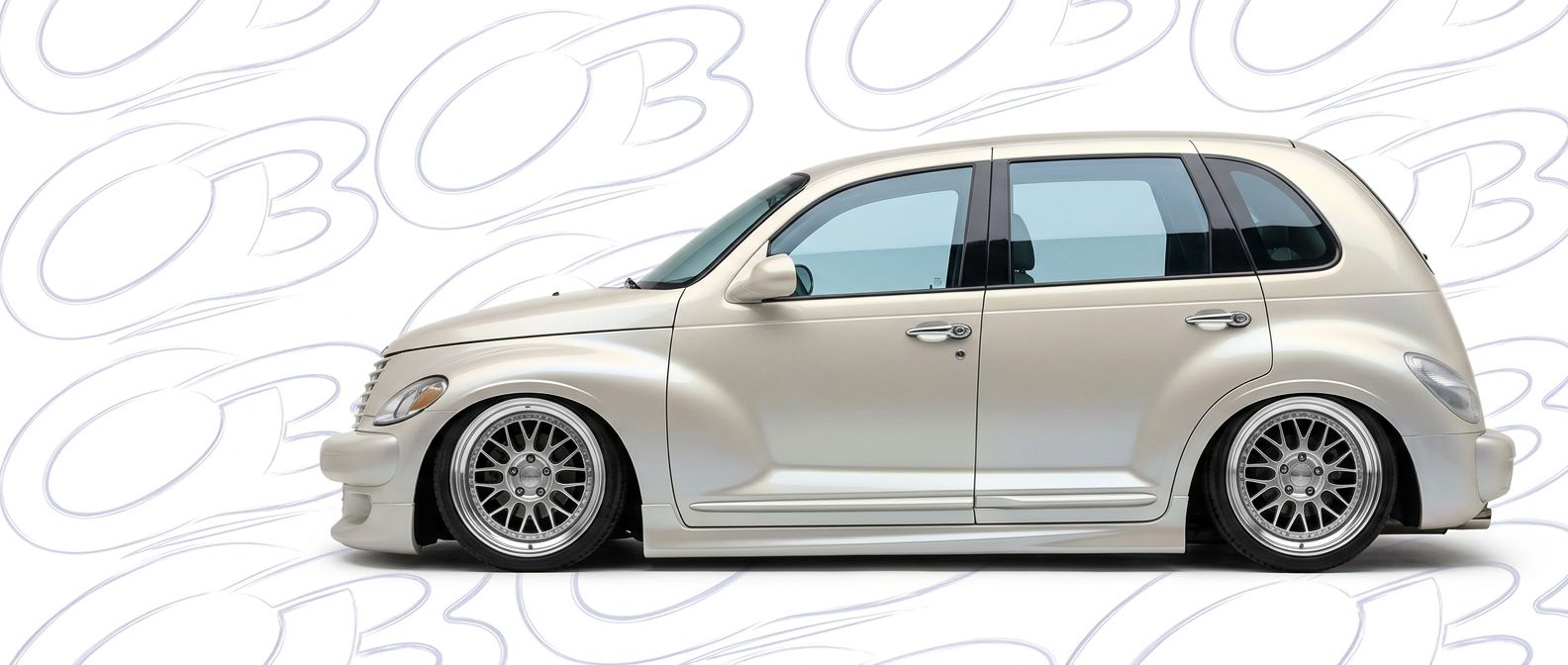 Front-angle view of 2002 Chrysler PT Cruiser 2002 - Durable and stylish exterior enhancement.