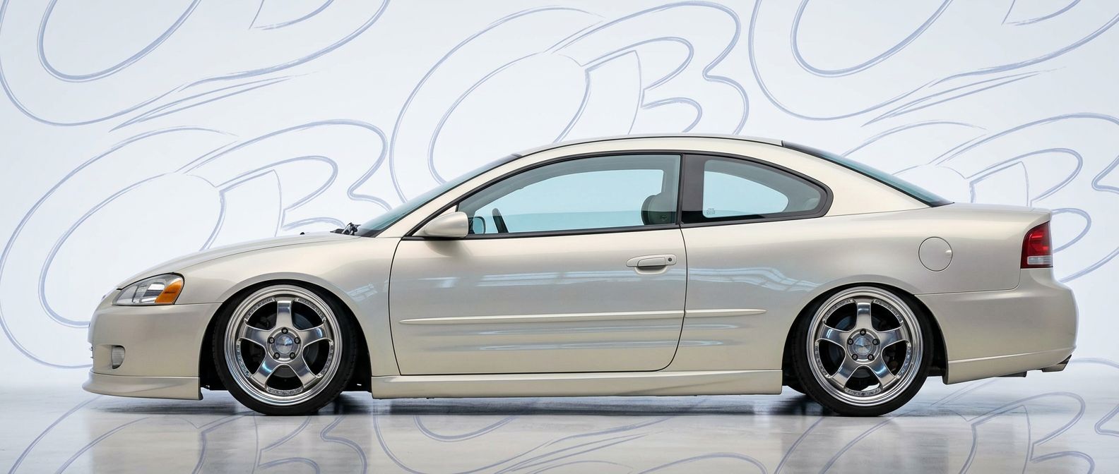 Professional automotive photography of a 2001 Chrysler Sebring with high-fidelity 2001.