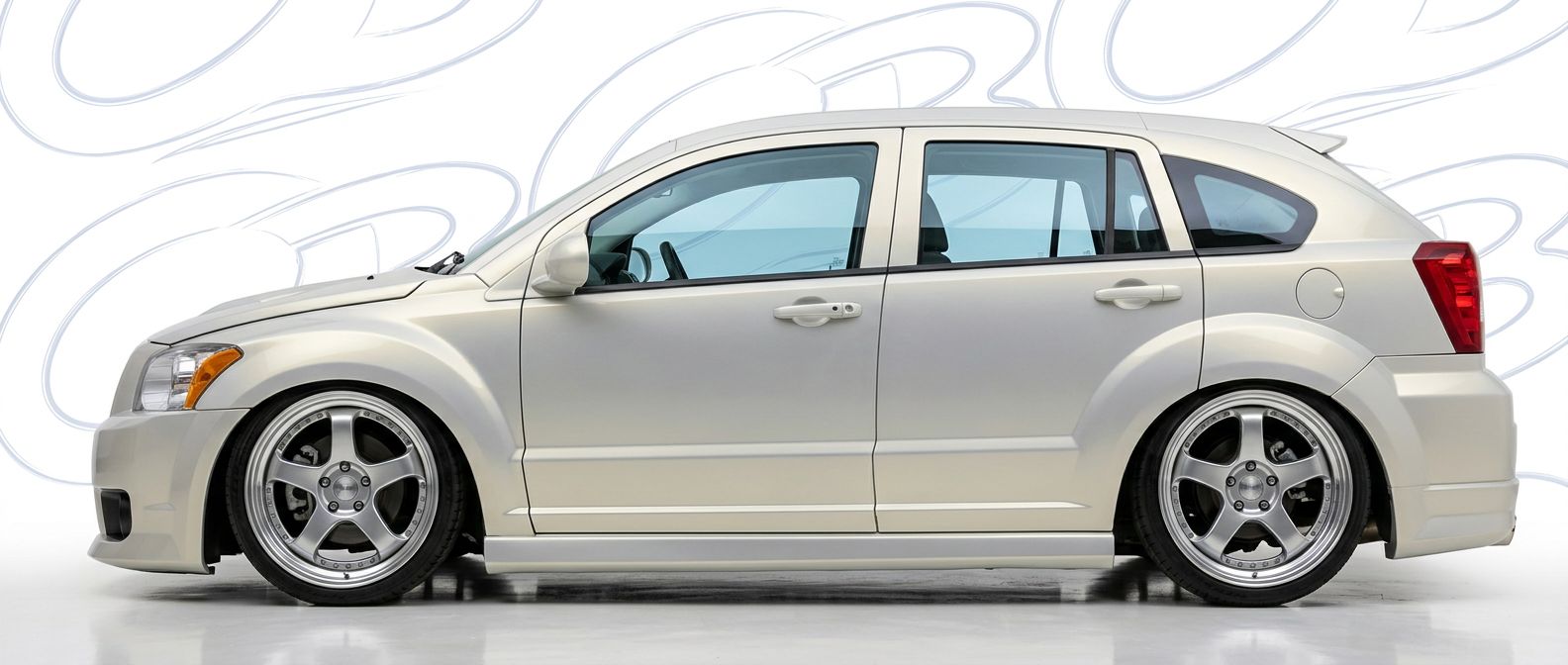 Top-tier  Dodge Caliber Caliber featuring a high-gloss finish and carbon fiber weave.