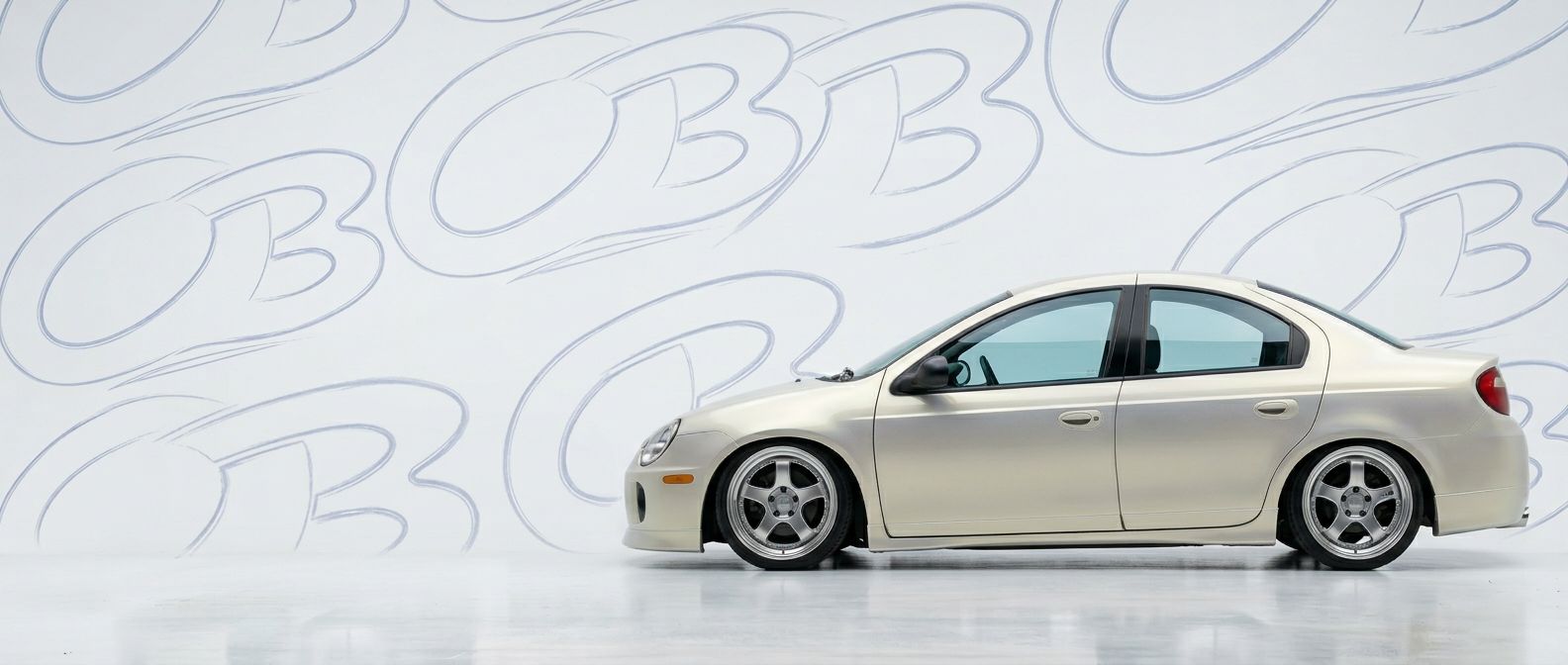 Top-tier 2001 Dodge Neon 2001 featuring a high-gloss finish and carbon fiber weave.