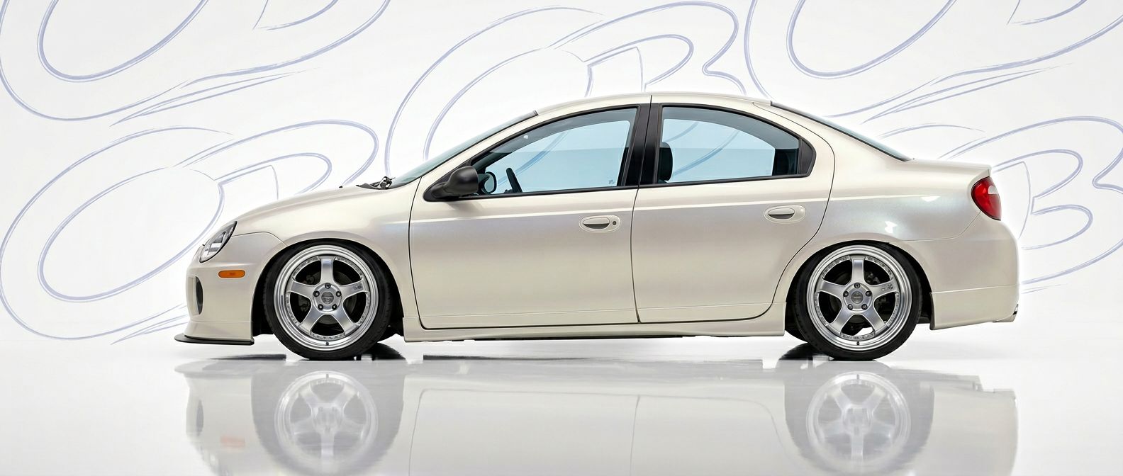 Top-tier 2005 Dodge Neon 2005 featuring a high-gloss finish and carbon fiber weave.