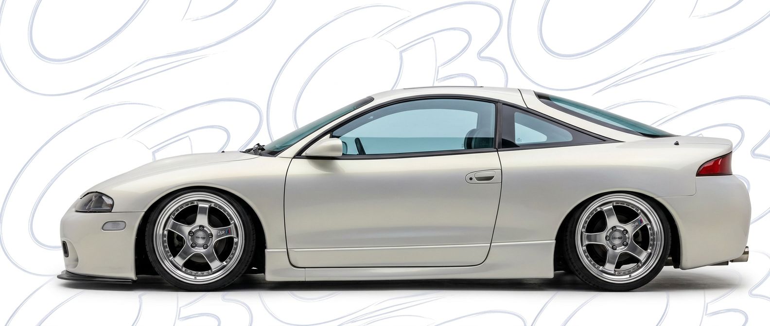 Top-tier  Eagle Talon Talon featuring a high-gloss finish and carbon fiber weave.