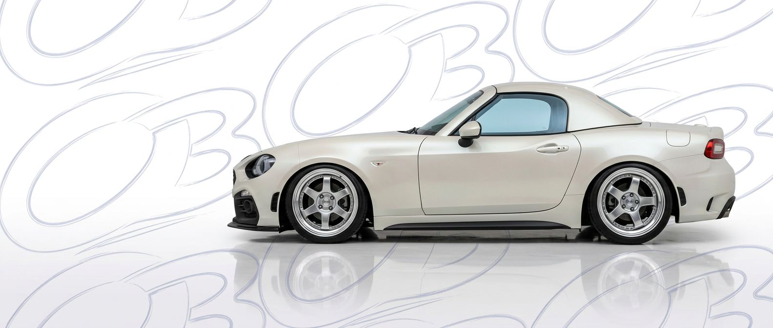 High-quality  Fiat 124 Spider 124 Spider exterior shot with professional studio lighting.