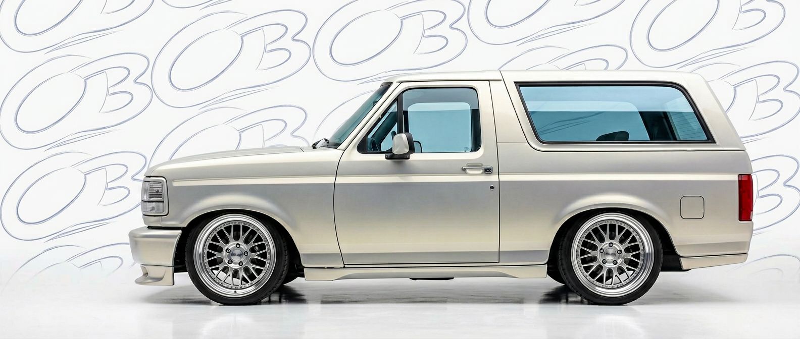 Professional automotive photography of a 1992 Ford Bronco with high-fidelity 1992.