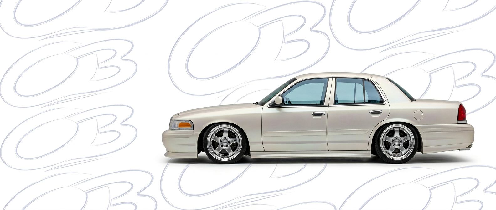 Top-tier 2000 Ford Crown Victoria 2000 featuring a high-gloss finish and carbon fiber weave.