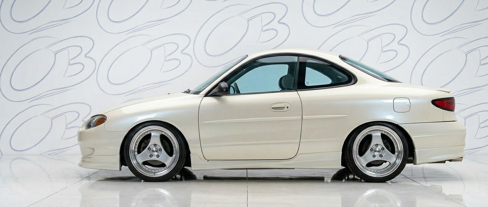 Professional automotive photography of a 2001 Ford Escort with high-fidelity 2001.