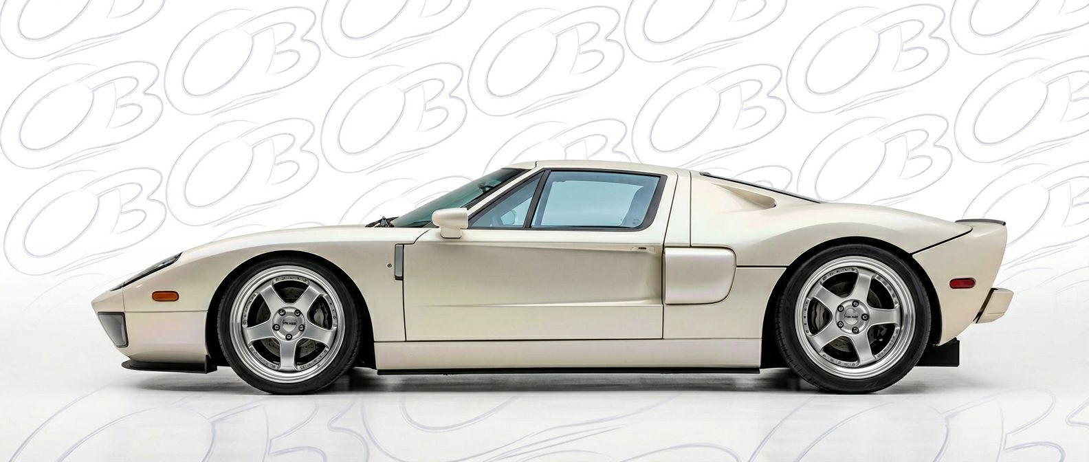 Professional automotive photography of a 1999 Ford GT with high-fidelity 1999.