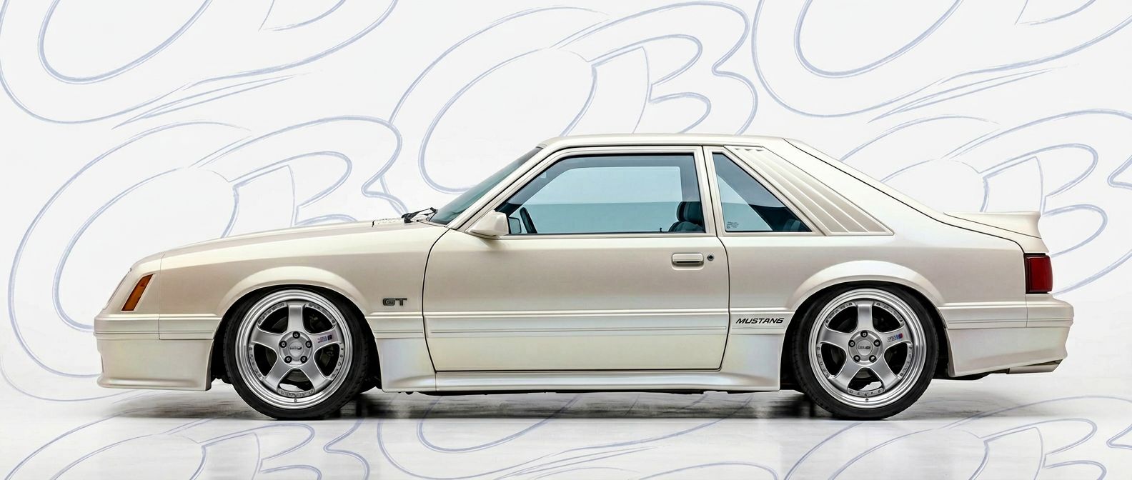 Professional automotive photography of a 1983 Ford Mustang with high-fidelity 1983.