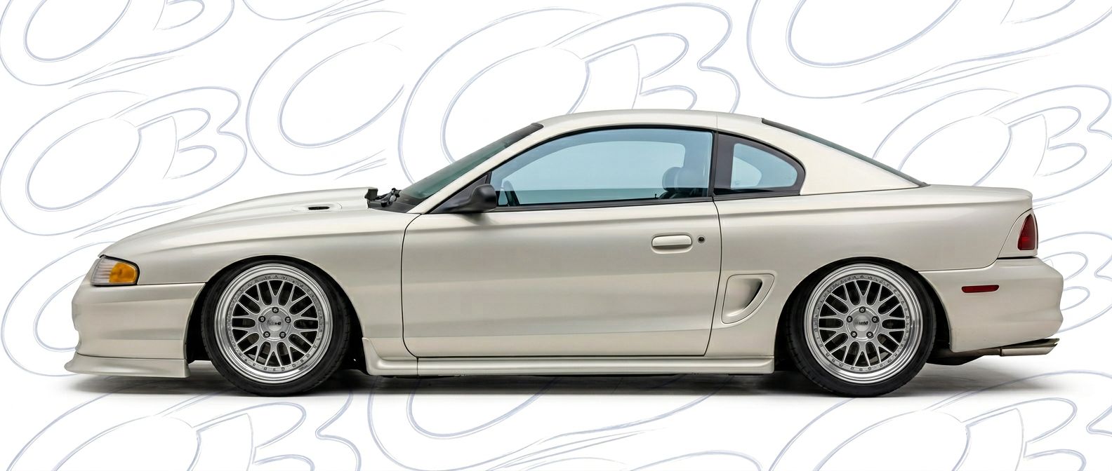 Professional automotive photography of a 1995 Ford Mustang with high-fidelity 1995.