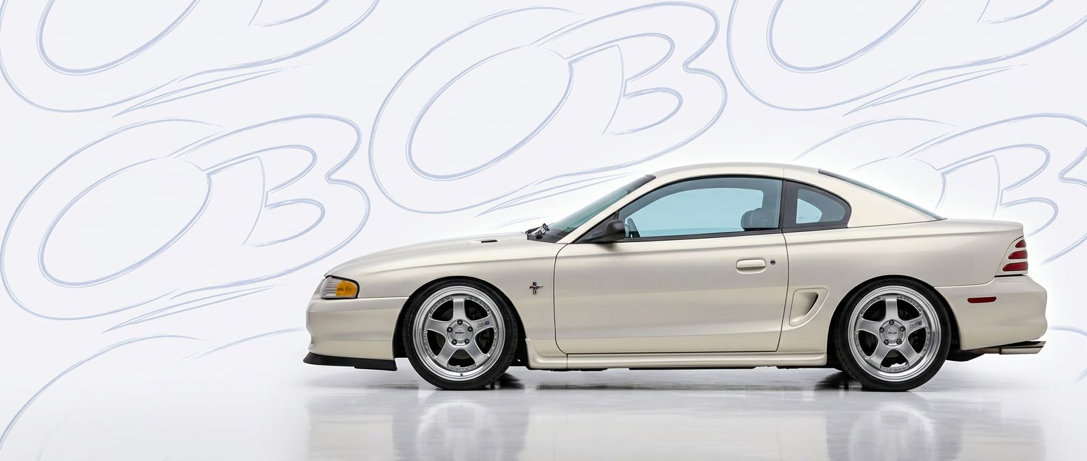 Professional automotive photography of a 1996 Ford Mustang with high-fidelity 1996.