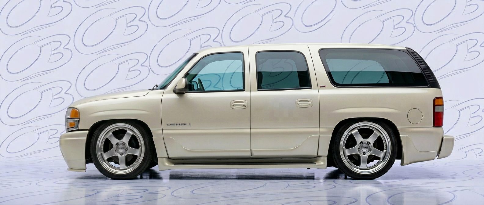 Professional automotive photography of a 2006 GMC Denali with high-fidelity 2006.