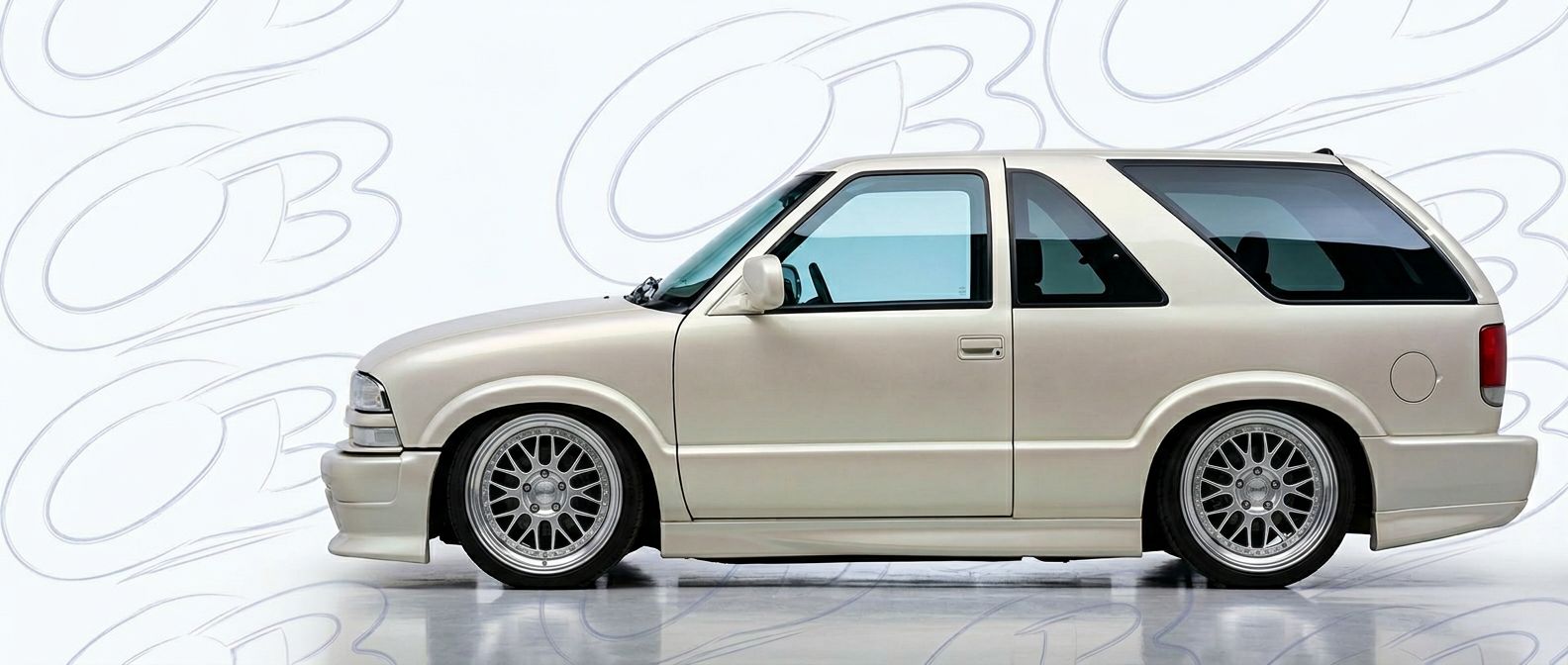 Professional automotive photography of a 1999 GMC Jimmy with high-fidelity 1999.