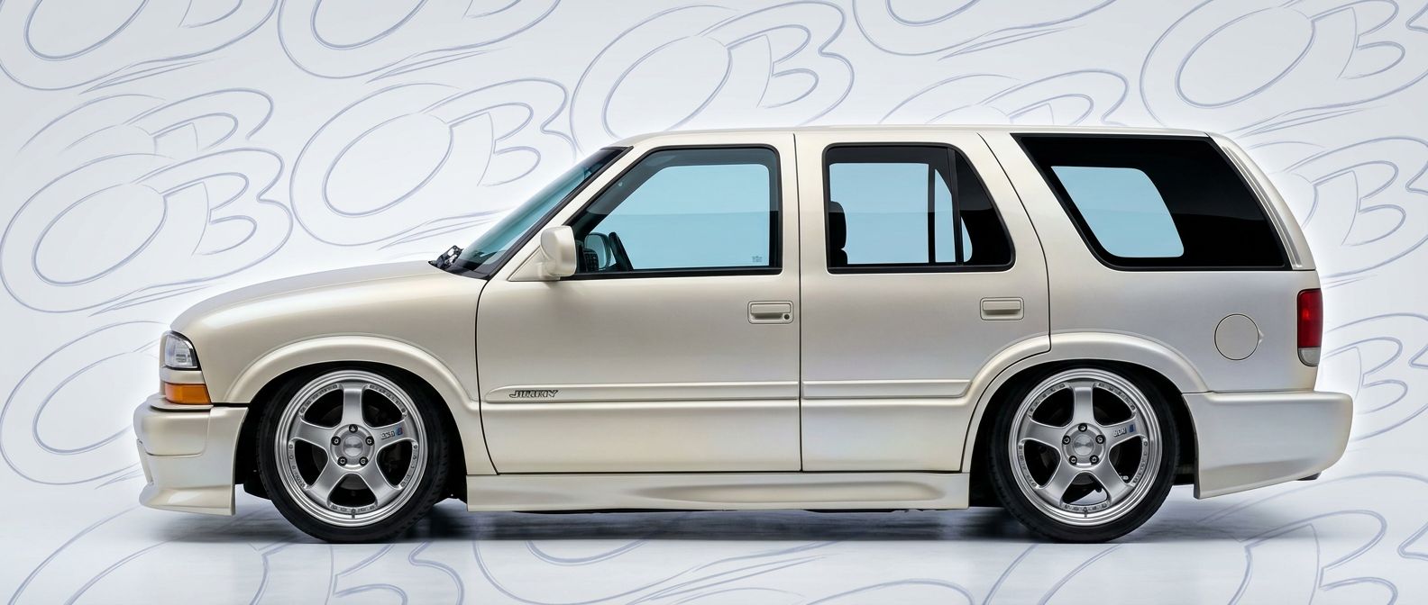 Custom 2002 for 2002 GMC Jimmy - Premium aerodynamic automotive body parts.