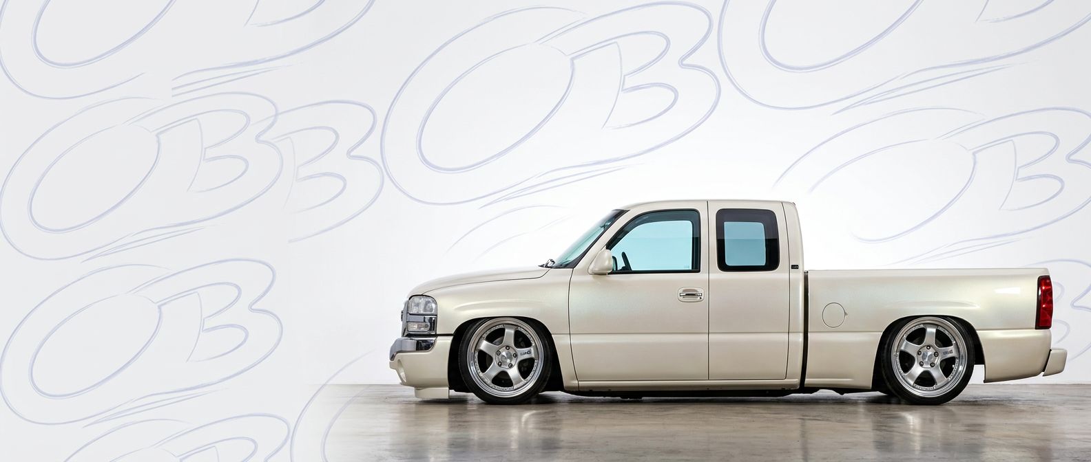 Professional automotive photography of a 2001 GMC Sierra with high-fidelity 2001.