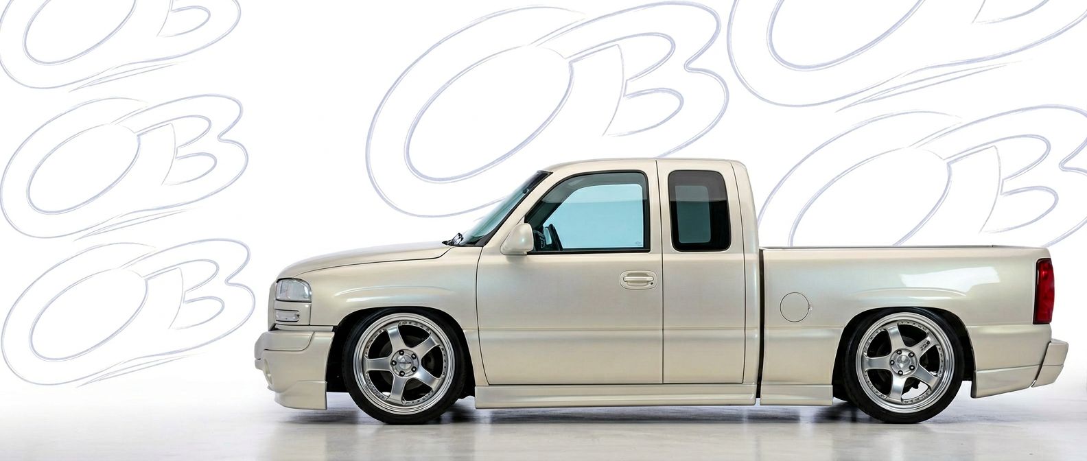 Top-tier 2006 GMC Sierra 2006 featuring a high-gloss finish and carbon fiber weave.