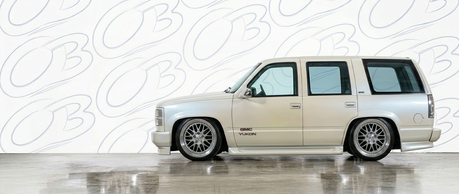 Professional automotive photography of a 1996 GMC Yukon with high-fidelity 1996.
