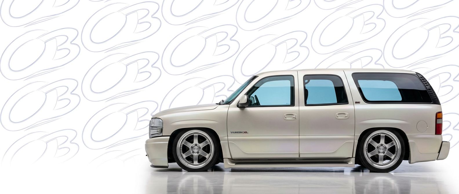 High-quality 2004 GMC Yukon XL 2004 exterior shot with professional studio lighting.