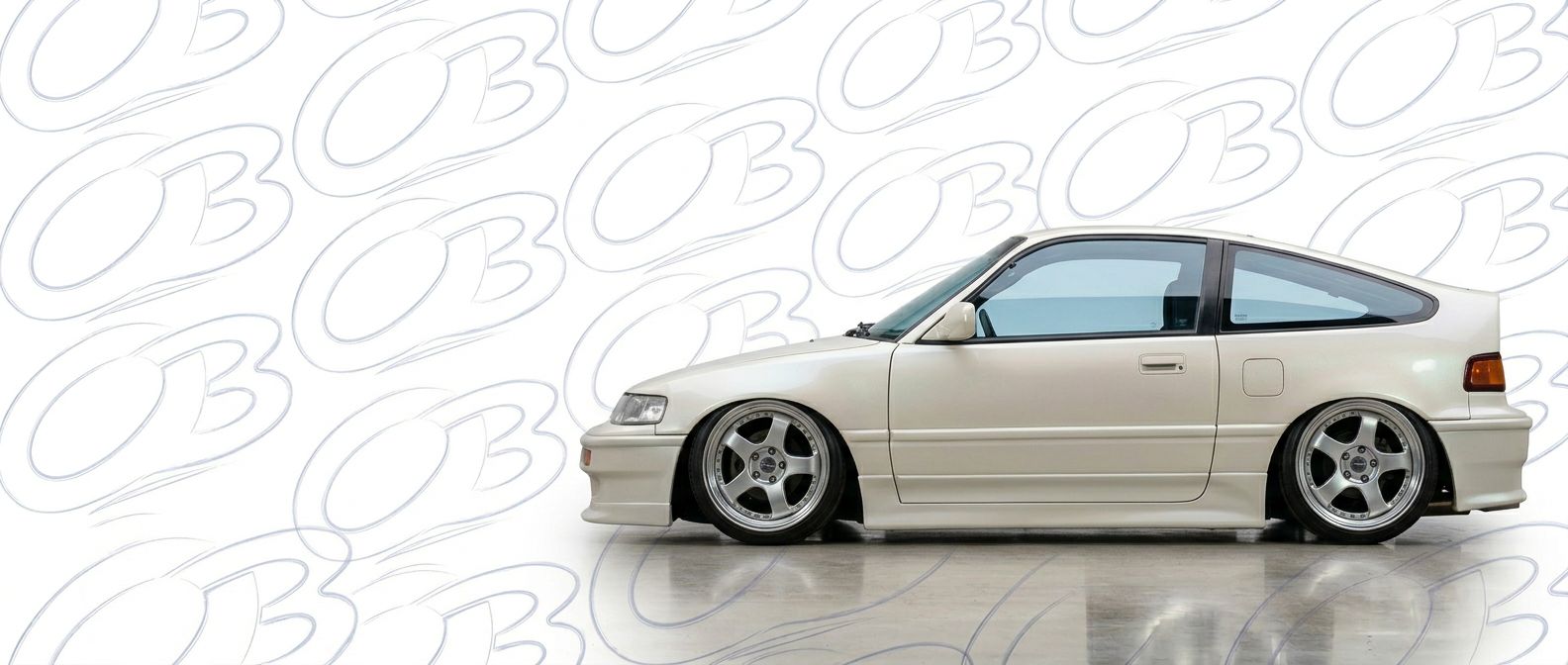 Professional automotive photography of a 1989 Honda CRX with high-fidelity 1989.