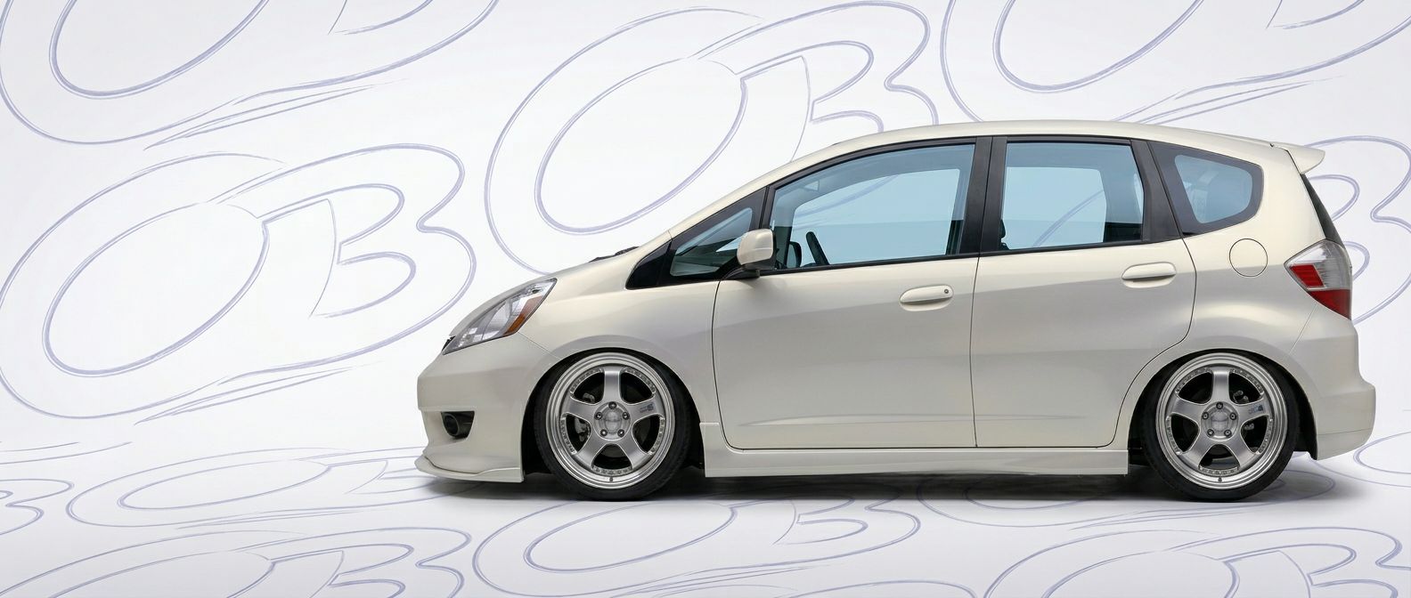 Professional automotive photography of a 2009 Honda Fit with high-fidelity 2009.