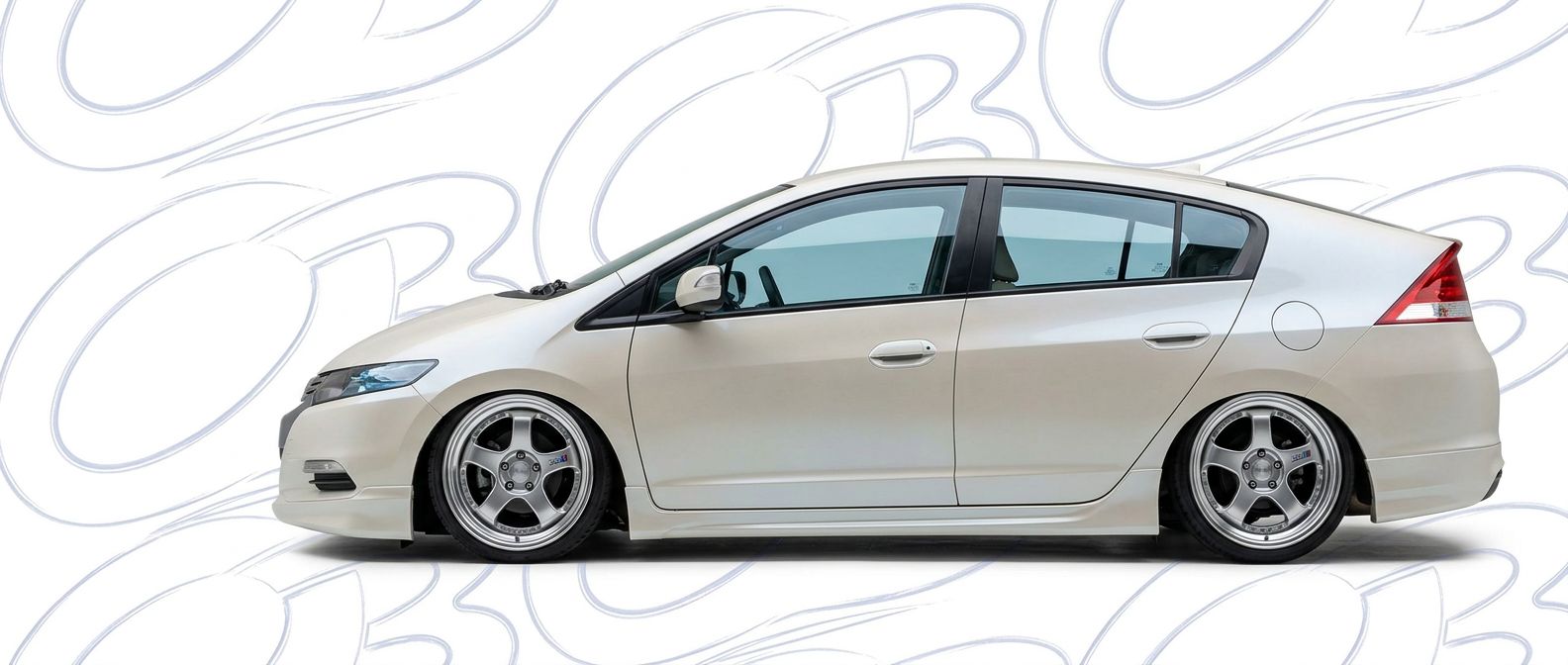 Top-tier 2012 Honda Insight 2012 featuring a high-gloss finish and carbon fiber weave.