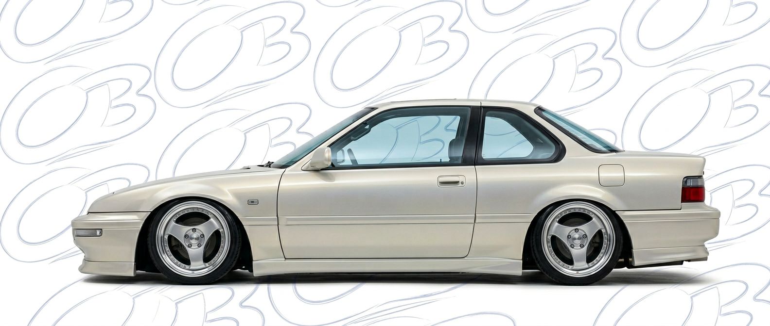 Professional automotive photography of a 1990 Honda Prelude with high-fidelity 1990.