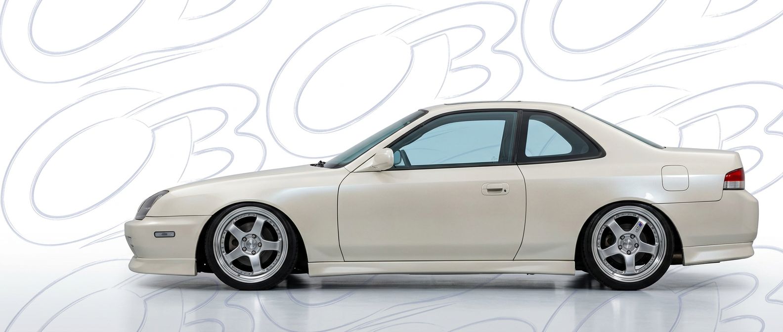 Top-tier 1996 Honda Prelude 1996 featuring a high-gloss finish and carbon fiber weave.