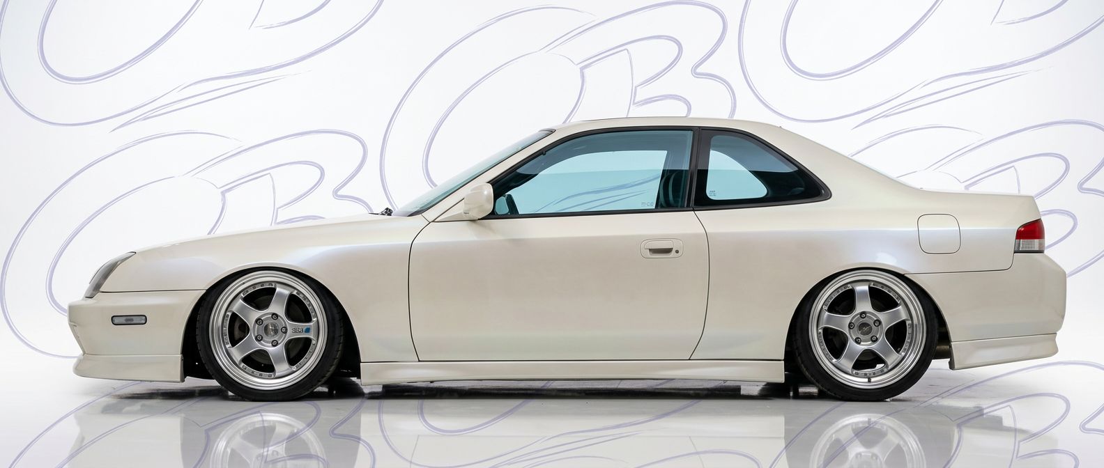 Professional automotive photography of a 1997 Honda Prelude with high-fidelity 1997.