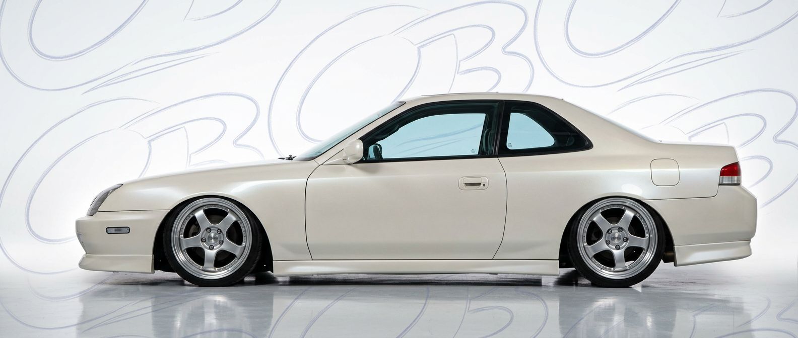 Top-tier 2001 Honda Prelude 2001 featuring a high-gloss finish and carbon fiber weave.