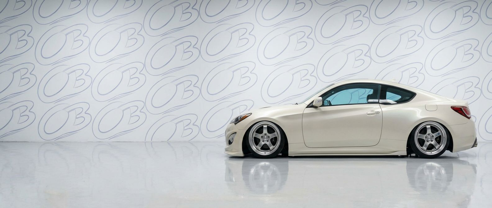 Top-tier 2014 Hyundai Genesis 2014 featuring a high-gloss finish and carbon fiber weave.