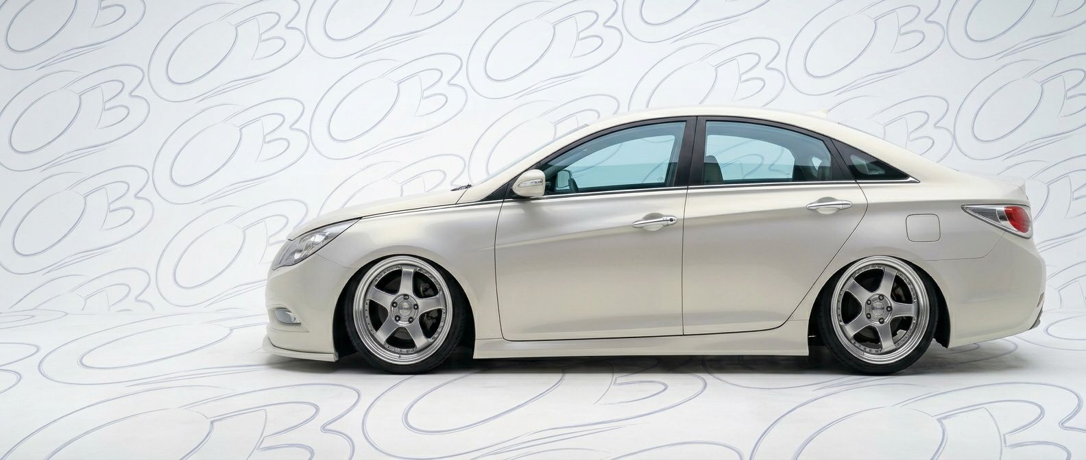 Professional automotive photography of a 2011 Hyundai Sonata with high-fidelity 2011.